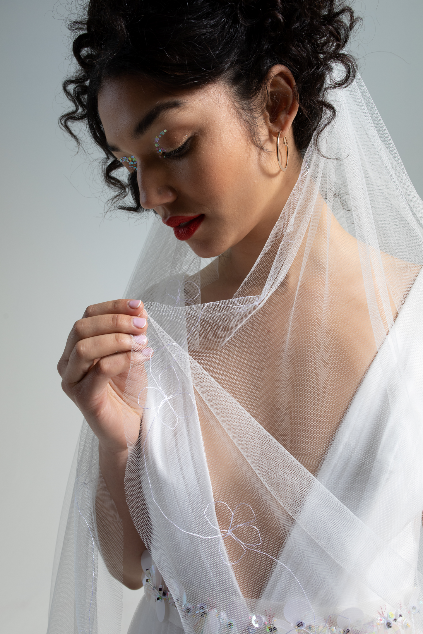 soft tulle hand-embroidered wedding veil, a floral embroidered bridal veil as part of a collection of decorative luxury bridal accessories, veils and bridal headwear