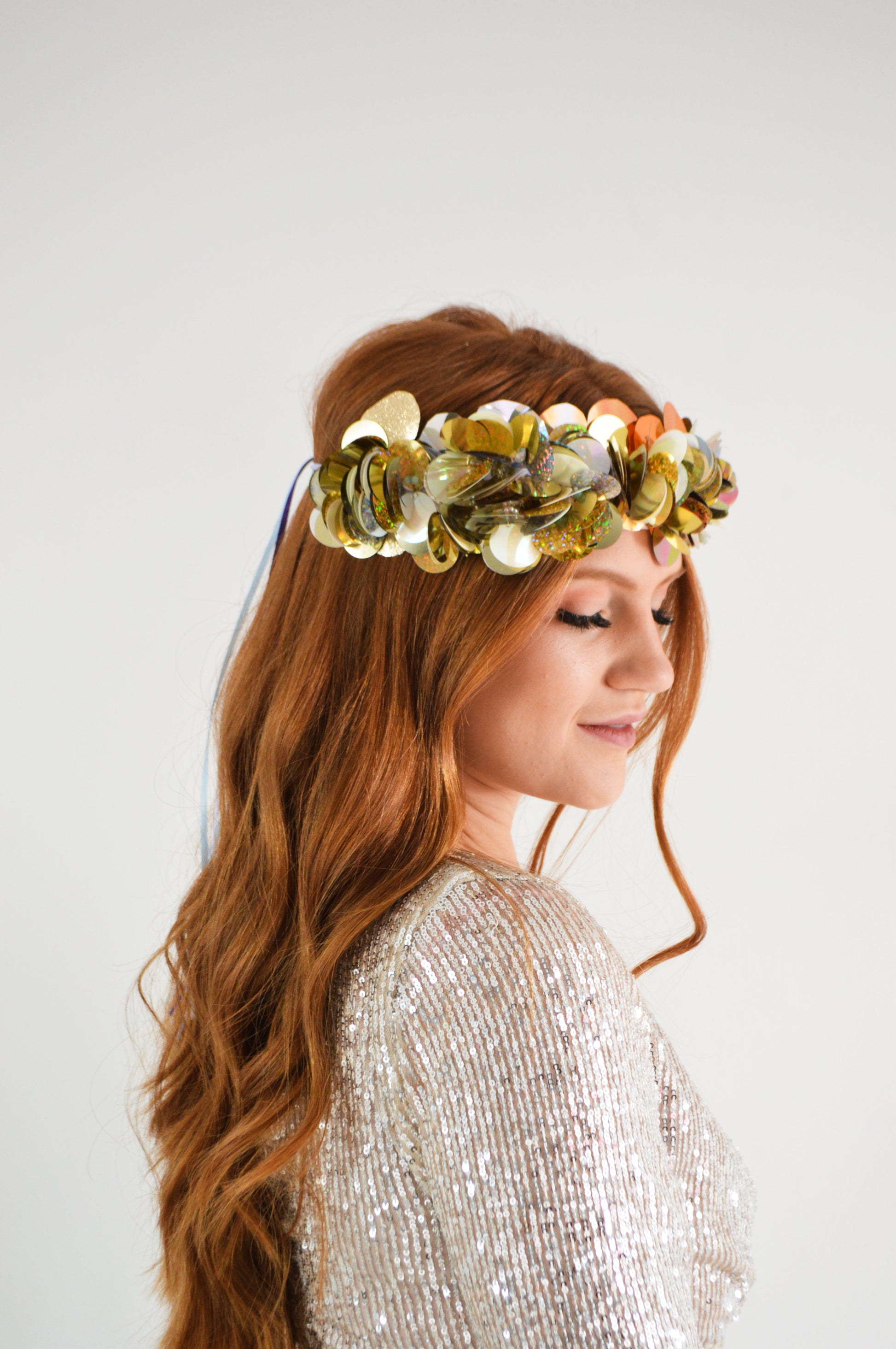 Hand-sewn colourful sequin flower crown, a vibrant festival crown as part of a collection of festival headwear, bridal accessories and bridal headwear.